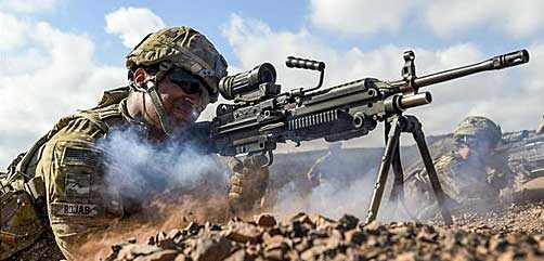 Army Pvt. Michael Rojas fires an M249 light machine gun during small arms training in Arta, Djibouti, May 2, 2017. Rojas is assigned to Combined Joint Task Force Horn of Africa's East African Response Force. Air Force photo by Staff Sgt. Nicholas M. Byers - ALLOW IMAGES