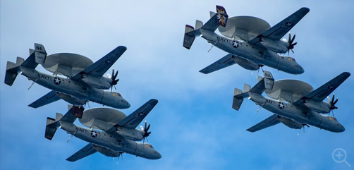 Four E-2C Hawkeyes fly in formation near the aircraft carrier USS Nimitz during routine operations in the Pacific Ocean, June 13, 2023. Image: DoD - ALLOW IMAGES