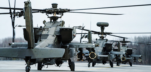 Nearly 20 AH-64D Apache Longbow helicopters assigned to 1-3rd Attack Battalion, 12th Combat Aviation Brigade, arrive at Lielvarde Military Airfield, Latvia, Feb. 24, 2022. Elements of the 12 CAB departed Germany for Lithuania and Latvia to conduct training with NATO allies in support of Saber Strike 22. 12 CAB trains and remains a constant and credible U.S. Army aviation force in support of allies and partners and the stability and security of Europe. - ALLOW IMAGES
