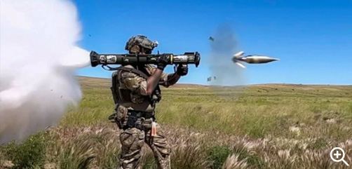 Click to Enlarge - A Green Beret fires an AT-4 anti-tank weapon during a heavy weapons rehearsal at the Yakima Training Center, Wash., June 24, 2022. This rehearsal provided an opportunity to fire both direct and indirect weapons which increases the team’s lethality. - ALLOW IMAGES