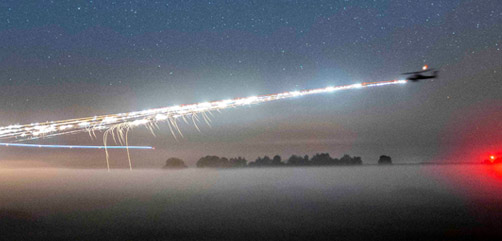An Apache helicopter fires rockets during a live-fire exercise in Bemowo Piskie, Poland, Sept. 16, 2020. Exercise Wojtek Fire coordinated assets from the United Kingdom, Croatia and the United States to support the NATO mission.- ALLOW IMAGES