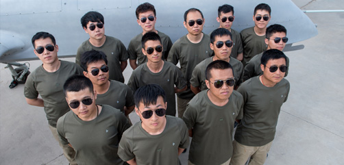 Chinese student pilots await their western instructor. Image: DepositPhotos - ALLOW IMAGES