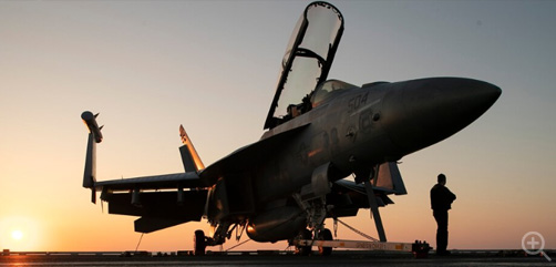 An E/A-18G attached to the "Grey Wolves" of Electronic Attack Squadron 142, sits chocked and chained to the flight deck of the aircraft carrier USS Gerald R. Ford, July 9, 2023. The Gerald R. Ford Carrier Strike Group is on a scheduled deployment in the U.S. Naval Forces Europe area of operations, employed by U.S. Sixth Fleet to defend U.S., allied, and partner interests.  Image: DoD - ALLOW IMAGES