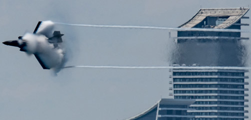 Air Force Maj. Kristin "BEO" Wolfe, F-35A Lightning II Demonstration Team pilot and commander, flies over the Toronto skyline during the 2021 Canadian International Air Show, Sept. 4, 2021. The show marked the first time the F-35 Demonstration Team had flown for the city of Toronto. - ALLOW IMAGES