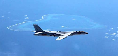 File photo taken in July, 2016 showing Chinese H-6K bomber patrolling islands and reefs including Huangyan Island in the South China Sea. (XINHUA NEWS AGENCY) - ALLOW IMAGES