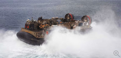 A Navy air-cushioned landing craft departs the well deck of the USS Makin Island during Balikatan 23 in the South China Sea, April 11, 2023. Balikatan is an annual exercise between the U.S. military and the Philippines armed forces designed to strengthen bilateral interoperability, capabilities, trust, and cooperation. Image: DoD