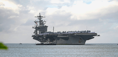 The aircraft carrier USS Abraham Lincoln (CVN 72) arrives at Joint Base Pearl Harbor-Hickam Jan. 8, 2020 as part of an around-the-world deployment that includes a homeport shift to San Diego. Abraham Lincoln has been underway in support of maritime security cooperation efforts in the U.S. 5th, 6th, and 7th Fleet areas of operation since April 1, 2019. - ALLOW IMAGES