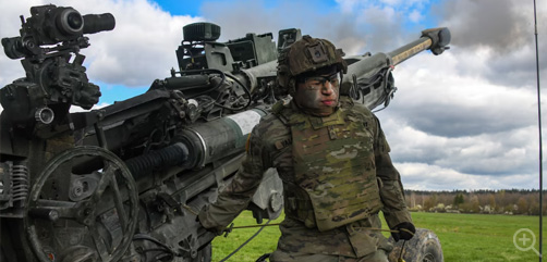 A soldier fires a M777 howitzer during a live-fire exercise at the 7th Army Training Command's Grafenwoehr Training Area, Germany, April 26, 2023. - ALLOW IMAGES