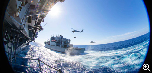 Navy MH-60S Knighthawks transport ammunition from the USNS Medgar Evers to the USS Gerald R. Ford in the Atlantic Ocean, Sept. 26, 2022. - ALLOW IMAGES