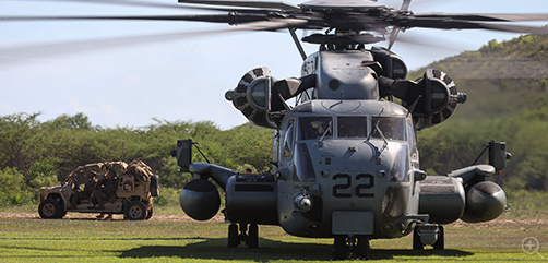 A U.S. Marine Corps CH-53 Super Stallion with Marine Medium Tiltrotor Squadron 263 (Reinforced), 22nd Marine Expeditionary Unit (Special Operations Capable), offloads equipment and personnel on Camp Santiago, Puerto Rico. - ALLOW IMAGES
