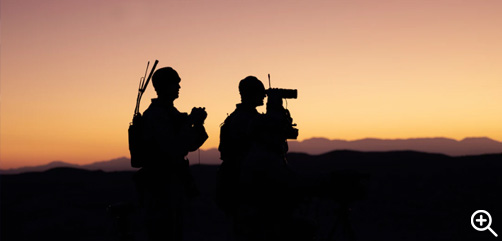 Marines observe impact zones during a fire support coordination exercise as part of Steel Knight, a combined arms live-fire exercise, at Marine Corps Air Ground Combat Center Twentynine Palms, Calif., Nov. 30, 2022. - ALLOW IMAGES