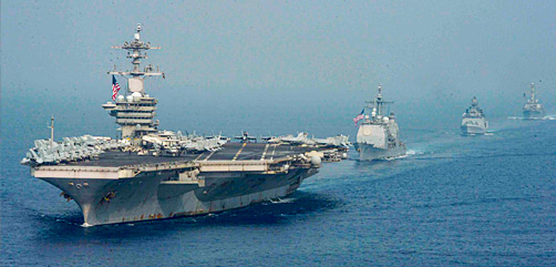 The USS Theodore Roosevelt, the USS Bunker Hill, the Indian navy Shivalik-class INS Shivalik and the USS Russell sail in formation in the Indian Ocean, March 28, 2021. - ALLOW IMAGES