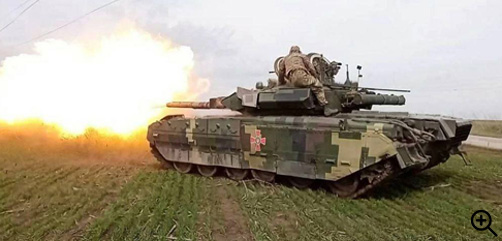 Ukrainian Armed Forces T-84U tank firing on Russian position.- ALLOW IMAGES