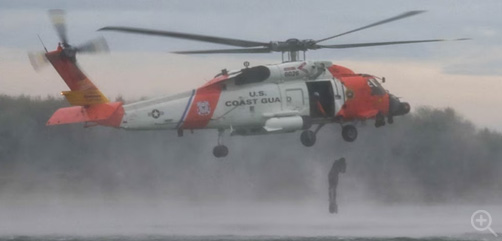 An Army combat diver helocasts from a Coast Guard helicopter into the Columbia River in Ilwaco, Wash., Nov. 3, 2023. The conditions provided the unique opportunity for combat divers to infiltrate in an austere maritime environment. Image: DoD  - ALLOW IMAGES