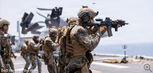 U.S. Marines fire weapons during a deck shoot aboard America-class amphibious assault ship USS Tripoli (LHA 7) in the Arabian Sea, April 2.  - ALLOW IMAGES.