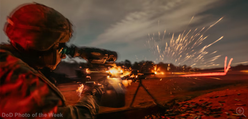 A soldier fires a machine gun during a nighttime qualification at Fort Bragg, N.C., Dec. 17, 2025. Image: DoW - ALLOW IMAGES.