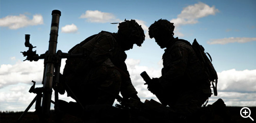 Army Spc. Brandon Almaguer, left, and Army Spc. Mattox Harrell, reorganize ammunition during a multinational live-fire exercise held at Rovaniemi Training Area, Finland, Aug. 11, 2022. Almaguer and Harrell are indirect-fire infantrymen assigned to the Viper Company, 1st Battalion, 26th Infantry Regiment, 2nd Brigade Combat Team, 101st Airborne Division. - ALLOW IMAGES