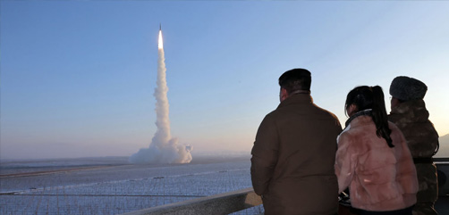 Kim Jung Un and daughter watch missile launch at location near Pyongyang. Image: KCNA  - ALLOW IMAGES
