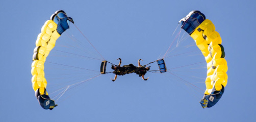 Members of the Navy Parachute Team, the Leap Frogs, perform during San Francisco Fleet Week, Oct. 9, 2021.