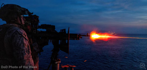 Marines conduct a live-fire exercise with a .50-caliber machine gun on the transport dock ship USS Portland in the Indo-Pacific region, June 12, 2026. The Marines, assigned to the 11th Marine Expeditionary Unit, are deployed on the Portland as part of the Boxer Amphibious Ready Group. - ALLOW IMAGES.