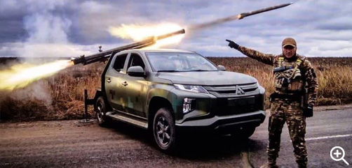 Mitsubishi L20 adapted to carry a single-tube GRAD missile launcher.- ALLOW IMAGES