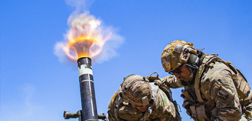 Army Col. Randy Lau fires a 120 mm mortar during a live-fire exercise at Camp Roberts, Calif., June 15, 2021. (U.S. Army photo by Staff Sgt. Walter Lowell) - ALLOW IMAGES