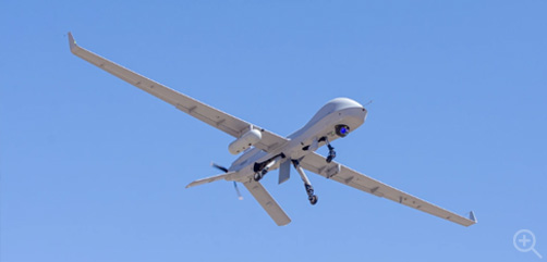 Soaring through the sky, an Extended Range / Multipurpose (ER/MP) Unmanned Aircraft System (UAS), simulates attacks on enemy targets during Project Convergence 20, at Yuma Proving Ground, Arizona. Image: DoD - ALLOW IMAGES