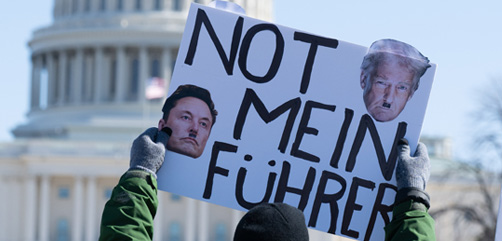 Demonstrators protests against President Trump and Elon Musk on the National Mall in Washington, DC. - ALLOW IMAGES