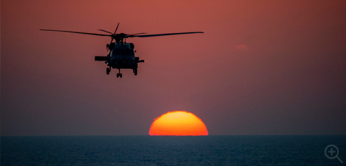 A Sea Hawk helicopter prepares to land on the flight deck of the aircraft carrier USS Dwight D. Eisenhower during training in the Atlantic Ocean, Feb. 28, 2023. Image: DoD