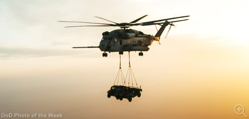 Marine Corps CH-53E Super Stallion pilots execute an air-to-air refuel during a heavy lift exercise as part of Weapons and Tactics Instructor course 2-25, near Yuma, Ariz., April 1, 2025.  The seven-week training emphasizes operational integration of the functions of Marine aviation to support Marine Air Ground Task Force, Joint and Coalition Forces.  Image: DoD - ALLOW IMAGES