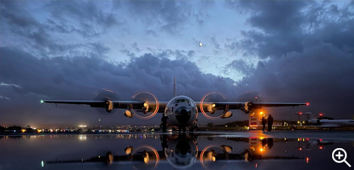 A Coast Guard  C-130 Hercules prepares for a night flight from Air Station Barbers Point in Hilo, Hawaii. - ALLOW IMAGES. 