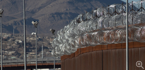 A section of the US/MX border fence. - ALLOW IMAGES