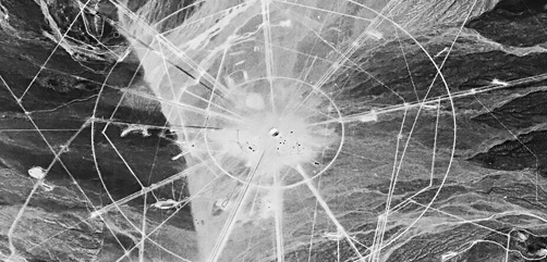 This is a 1952 aerial photograph of a nuclear test subsidence crater at the Nevada Test Site, located ~65 miles northwest of Las Vegas, NV. 928 nuclear tests were carried out at this facility between 1951 and 1992. 100 were atmospheric and the rest were underground.